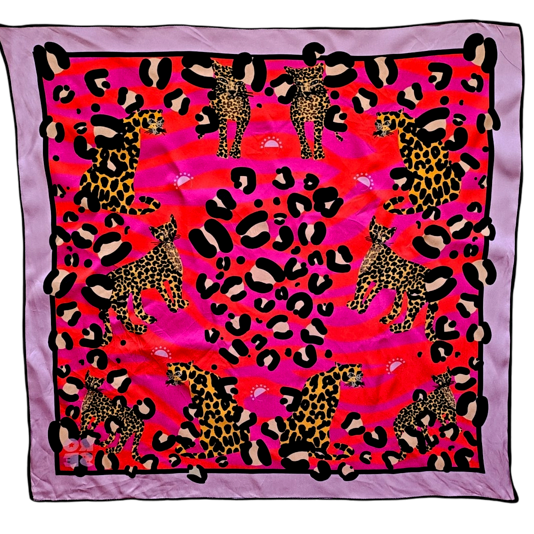 Scarf with leopard print design on a pink and purple background